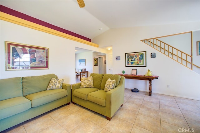 living room featuring light tile patterned floors and lofted ceiling