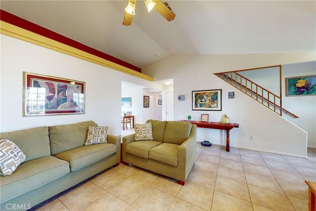 tiled living room with ceiling fan and vaulted ceiling