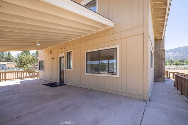 exterior space featuring a patio area and a mountain view