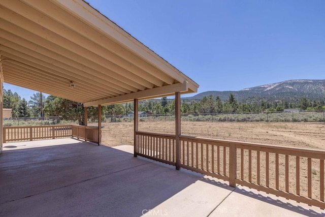 view of patio / terrace with a mountain view