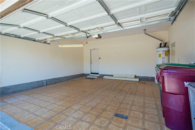 garage featuring a garage door opener and gas water heater