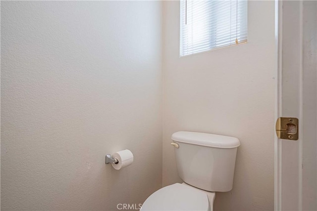 bathroom featuring toilet