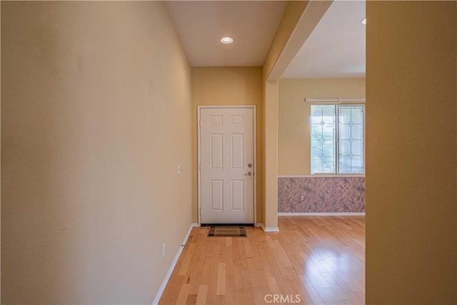 corridor featuring light hardwood / wood-style flooring