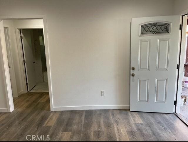 interior space with dark hardwood / wood-style floors