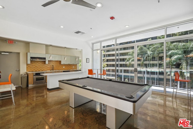 recreation room featuring ceiling fan, sink, and pool table