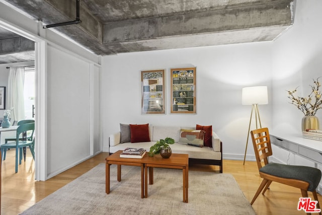 living area with light hardwood / wood-style floors