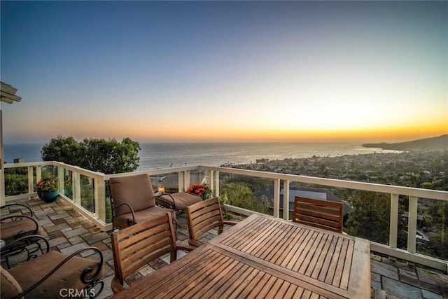 deck at dusk with a water view