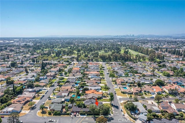 birds eye view of property with a residential view