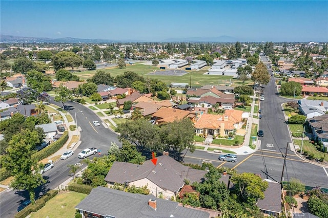 birds eye view of property with a residential view