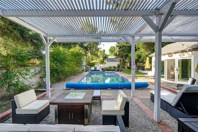 view of swimming pool featuring a patio, outdoor lounge area, and a pergola