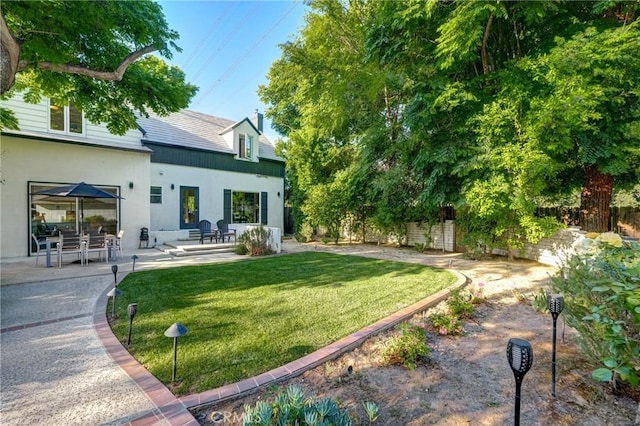 view of yard with a patio area