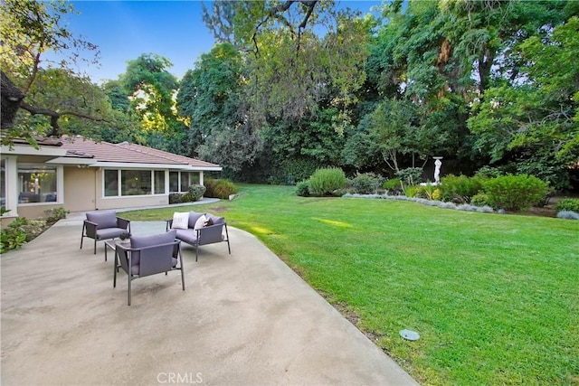 exterior space featuring a patio and an outdoor hangout area