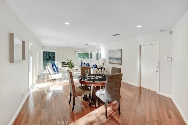 dining room featuring wood-type flooring