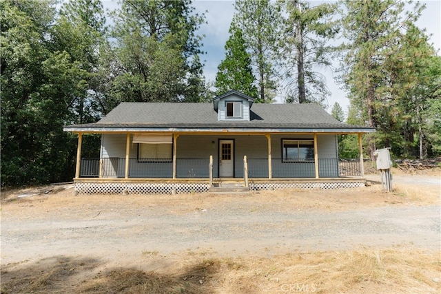 farmhouse-style home with covered porch