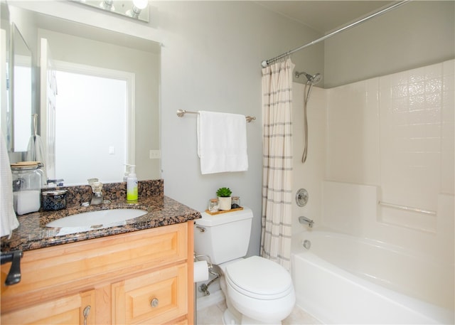 full bathroom with shower / tub combo with curtain, vanity, toilet, and tile patterned flooring