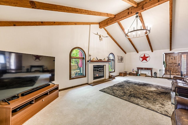 carpeted living room with an inviting chandelier, beam ceiling, and high vaulted ceiling