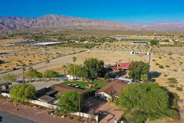 drone / aerial view featuring a mountain view