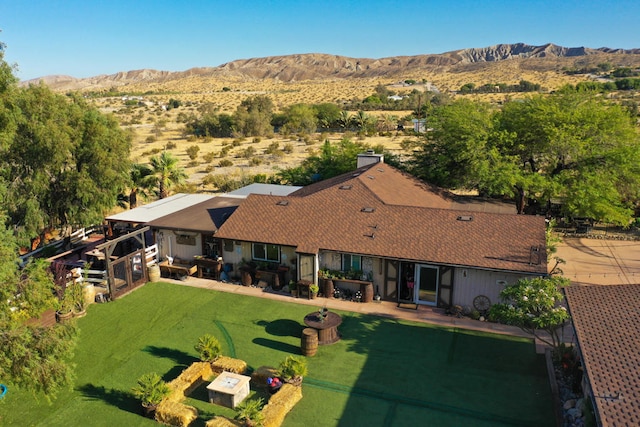 aerial view featuring a mountain view