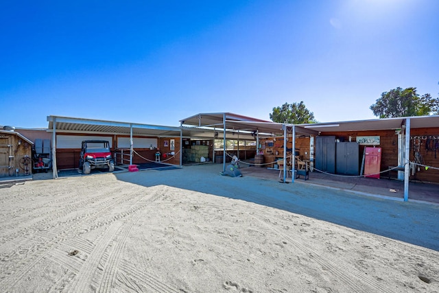 view of front of home with an outdoor structure