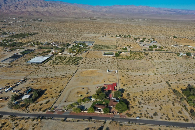 bird's eye view featuring a mountain view and a rural view