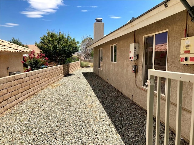 view of home's exterior with a patio area