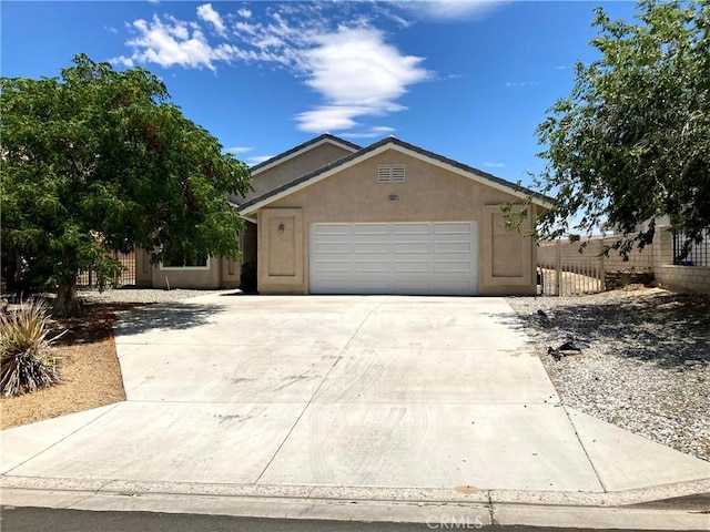 single story home with a garage