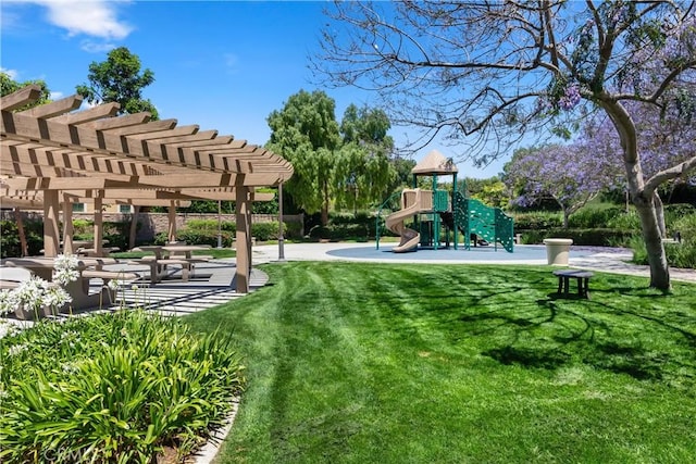 surrounding community featuring a playground, a pergola, and a lawn