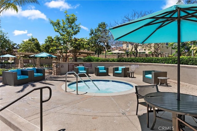 view of pool featuring an outdoor living space and a patio