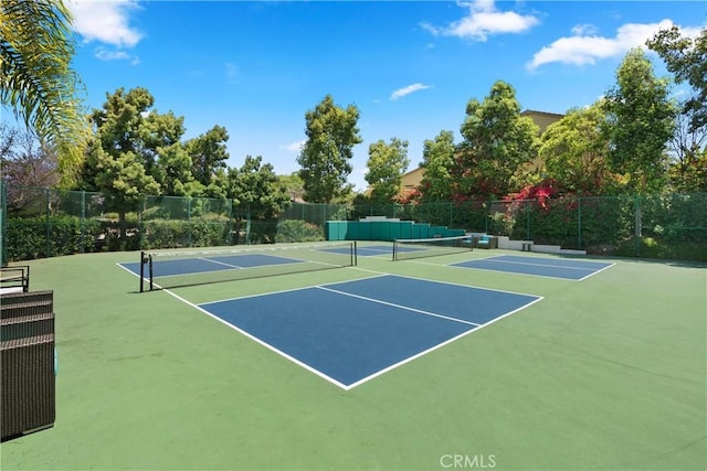 view of sport court featuring basketball hoop