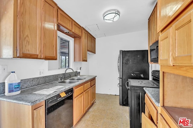 kitchen with sink and black appliances