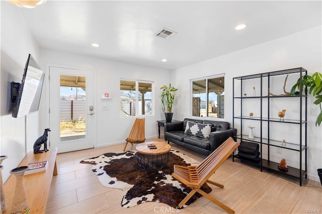 sitting room with light tile patterned flooring