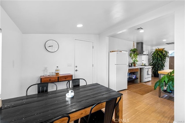 dining room featuring light wood-type flooring