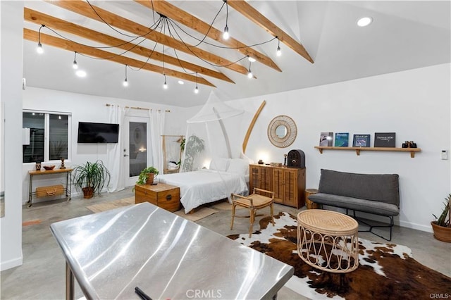 bedroom featuring vaulted ceiling with beams