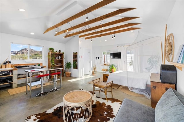 bedroom with finished concrete flooring, beamed ceiling, multiple windows, and recessed lighting