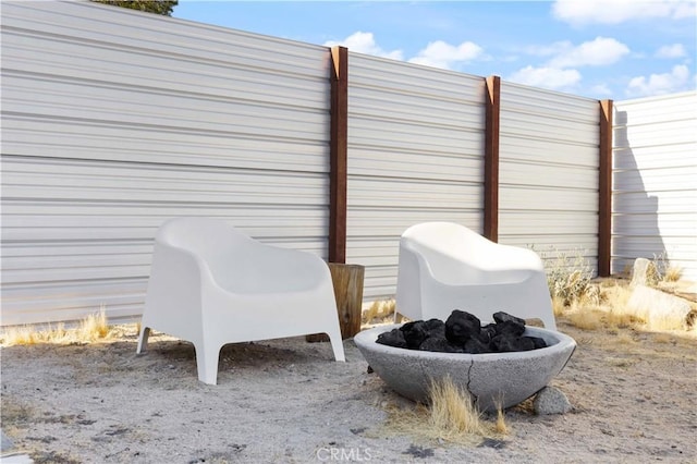 exterior space featuring a fire pit
