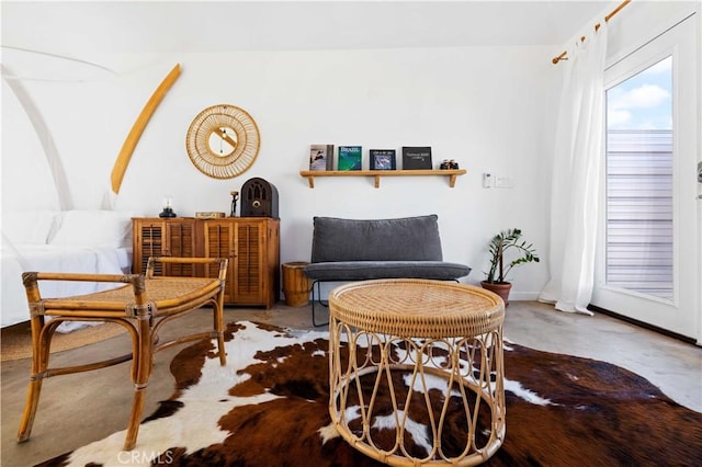 sitting room with concrete floors