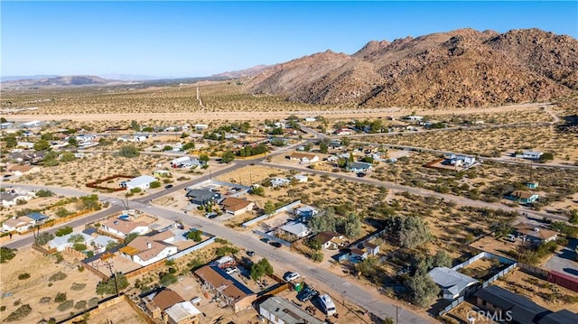 bird's eye view with a residential view and a mountain view