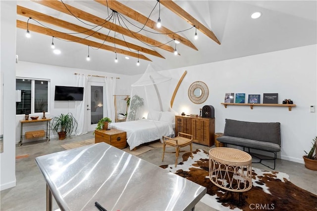 interior space with lofted ceiling with beams, concrete floors, recessed lighting, and baseboards