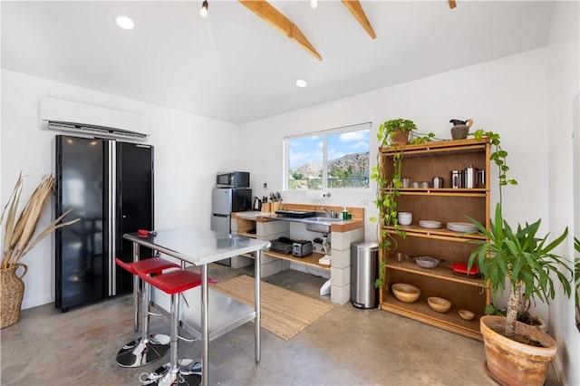 office space featuring recessed lighting, concrete flooring, and a wall mounted AC