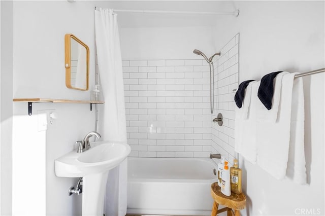 bathroom featuring shower / bathtub combination with curtain