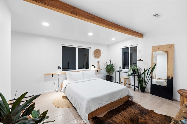 bedroom with baseboards, visible vents, beamed ceiling, and recessed lighting