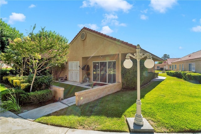 exterior space featuring a yard