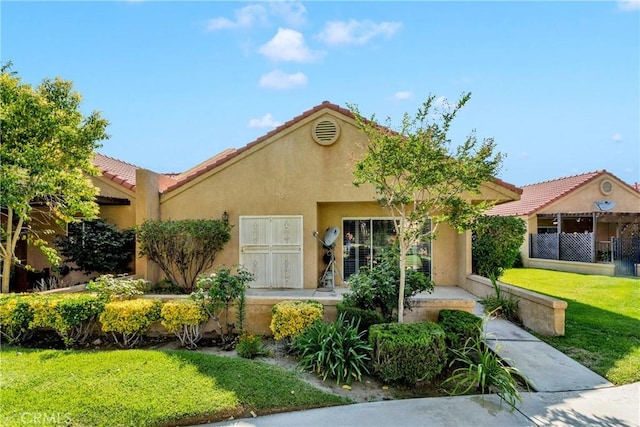 11611 Park Ln, Apple Valley, CA 92308 - view of front of property with a tile roof, a front lawn, and stucco siding