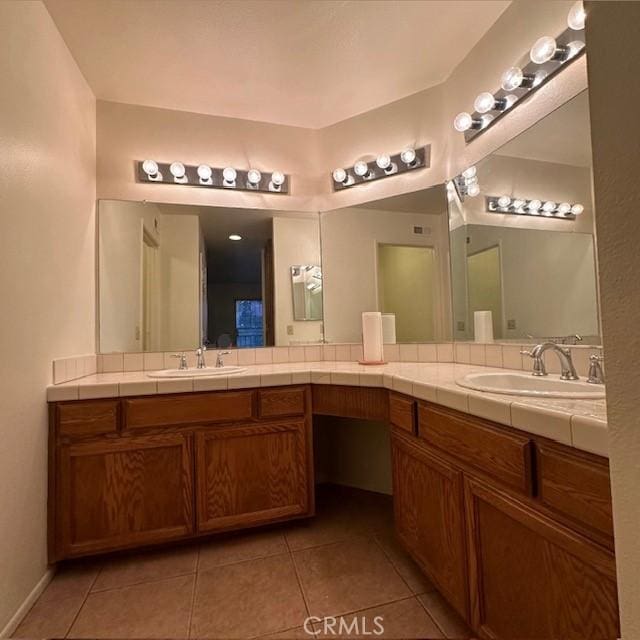 11611 Park Ln, Apple Valley, CA 92308 - full bath with tile patterned floors, double vanity, and a sink