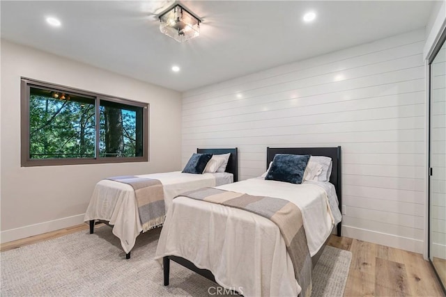 bedroom with light hardwood / wood-style floors