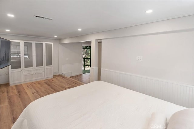 bedroom featuring wood-type flooring