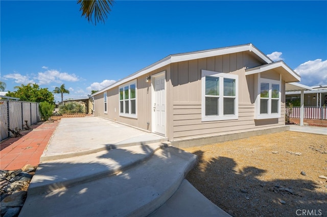 view of property exterior featuring a patio