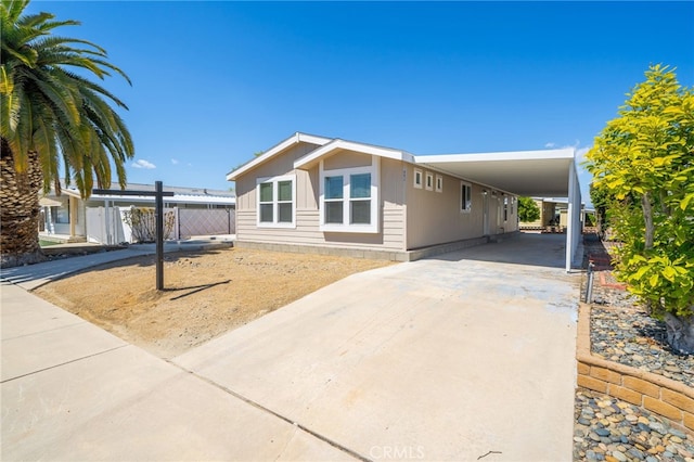 view of front of house featuring a carport