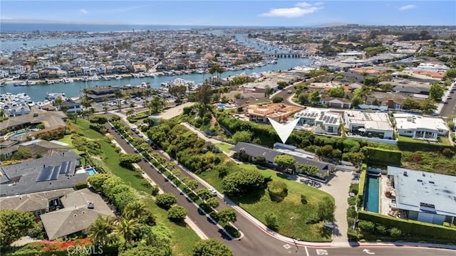 bird's eye view with a water view