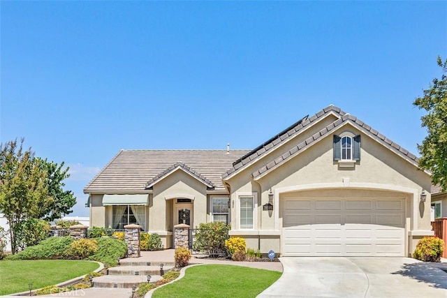 view of front of property with a garage